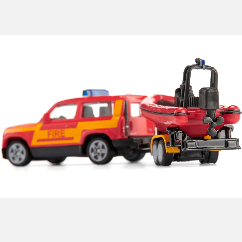 Siku - Land Rover Defender z łodzią